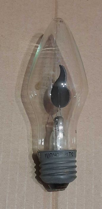 Неоновая лампочка свеча