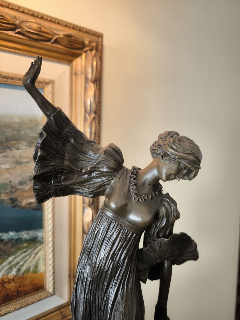 Escultura em bronze