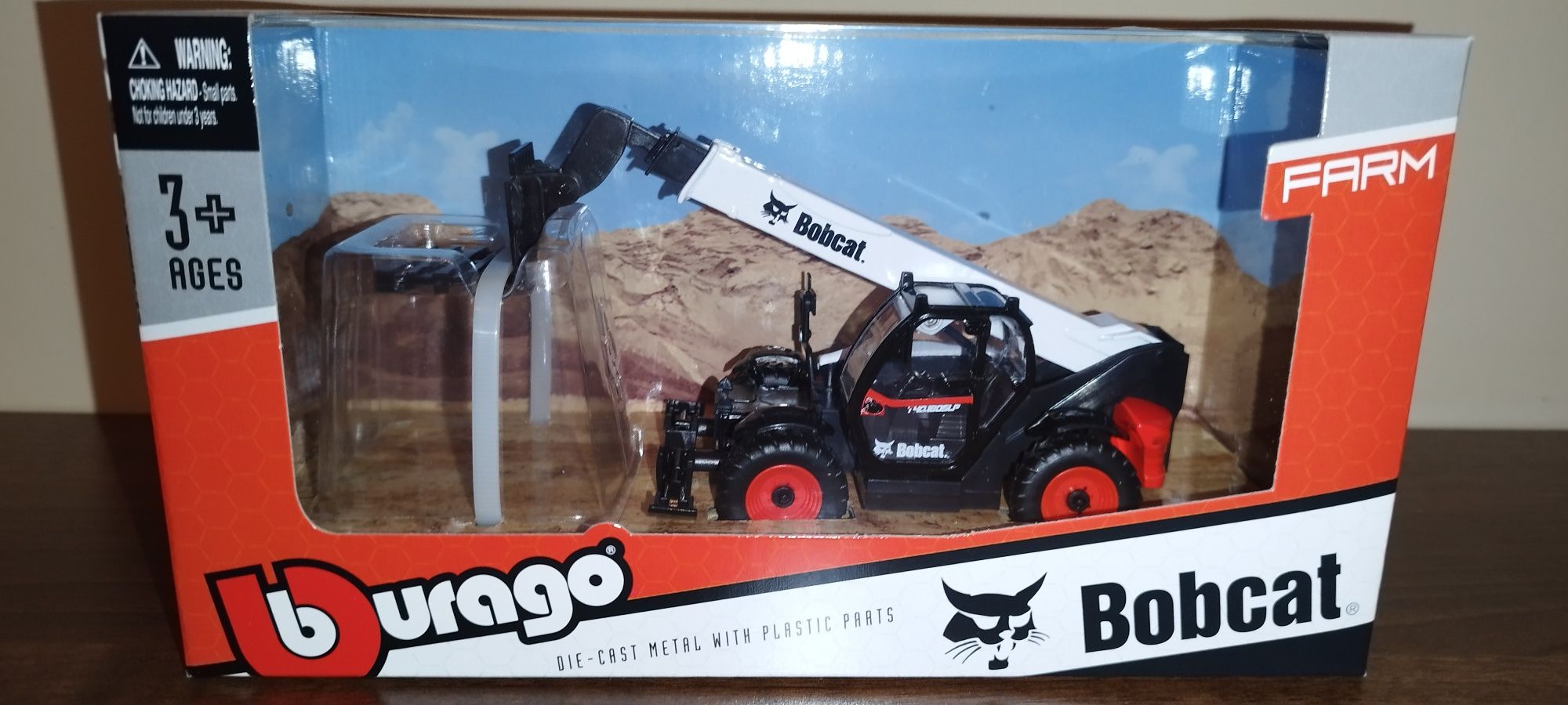 Bburago ladowarka teleskopowa z widlami do palet Bobcat T40. 180SLP, w