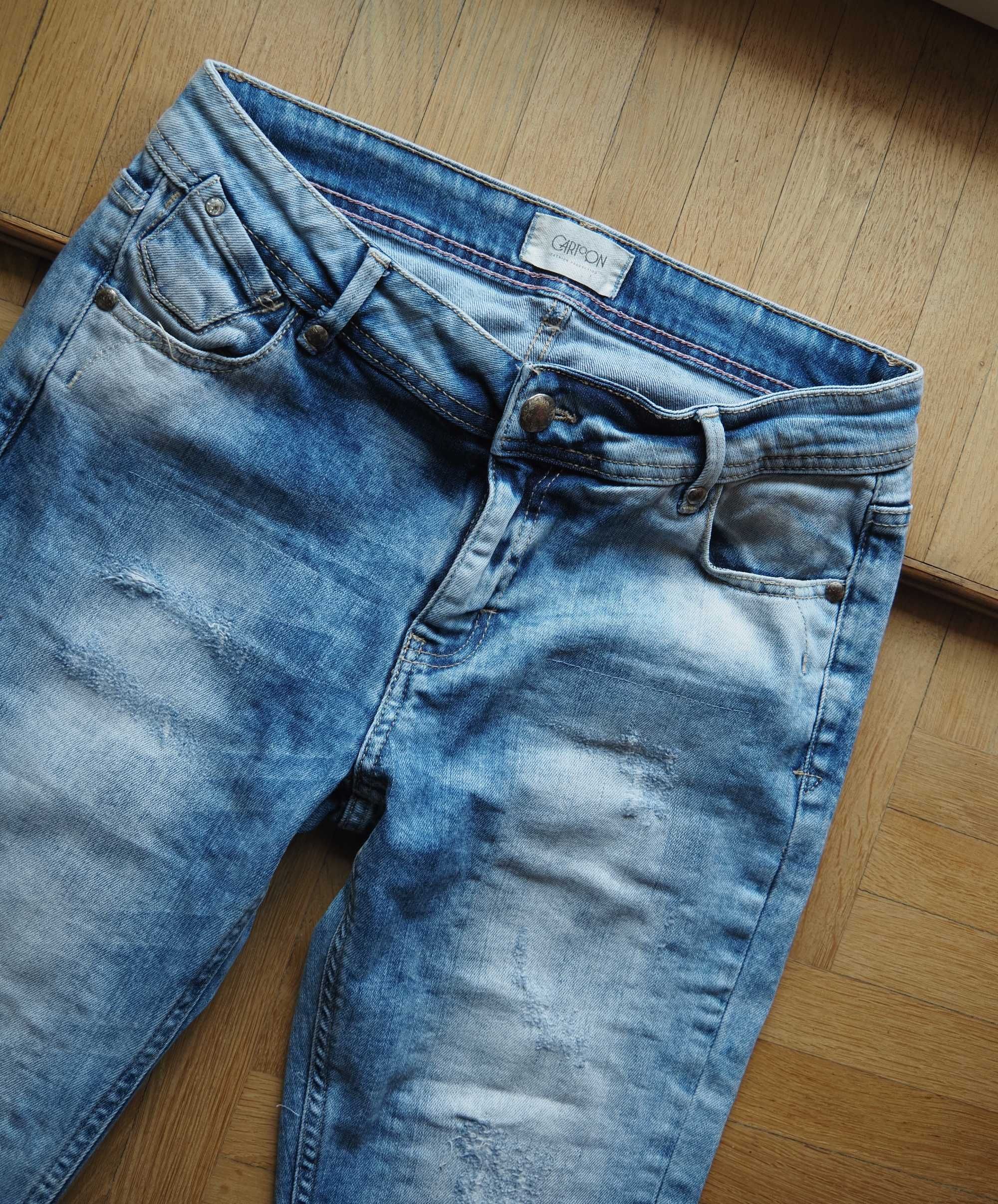 Jasne jeansy z przetarciami Cartoon stan idealny M