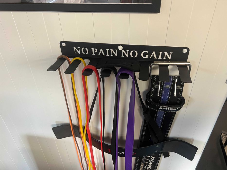 Wieszak uchwyt 8 pozycyjny na gumy pasy skakanki itp. akcesoria