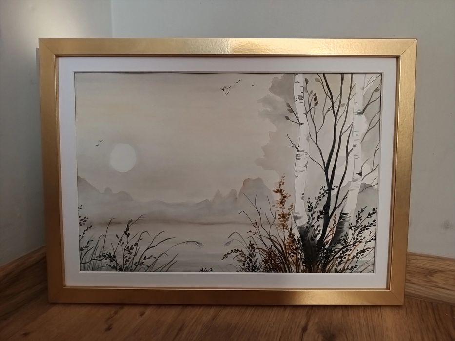 Akwarela w złotej ramie