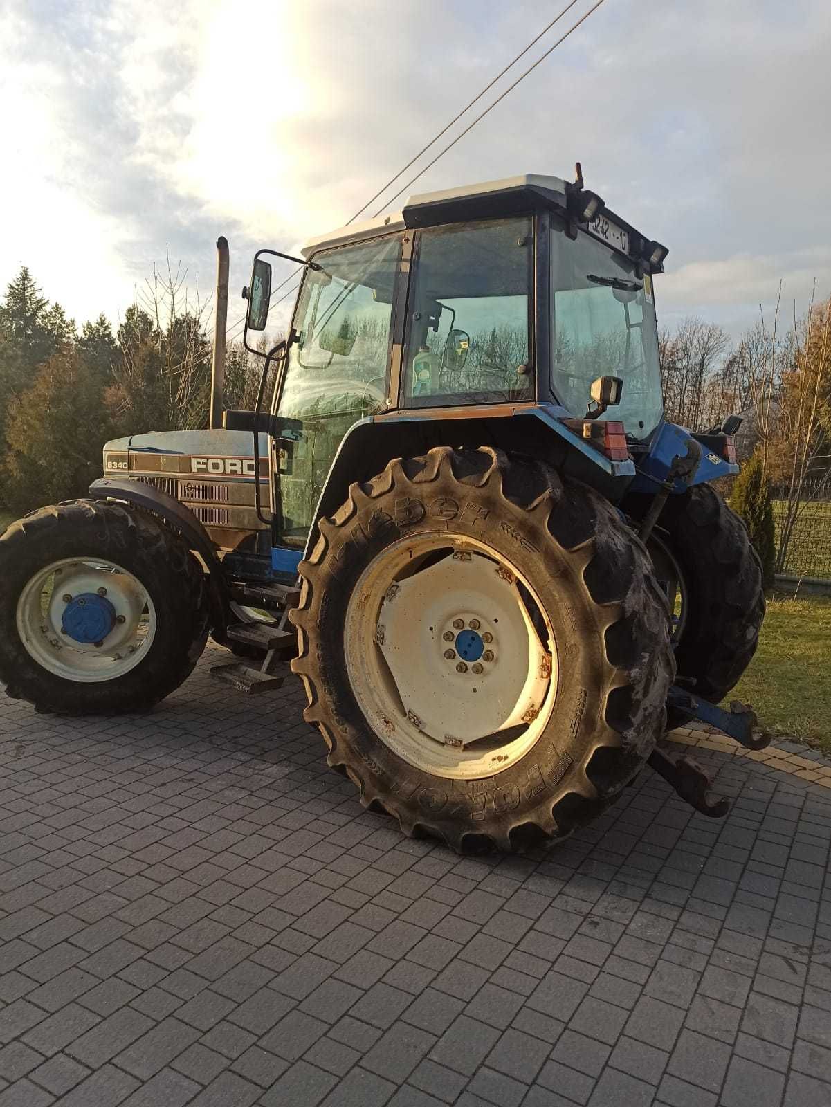 Ciągnik traktor Ford 8340 sprowadzony obciążniki new holland