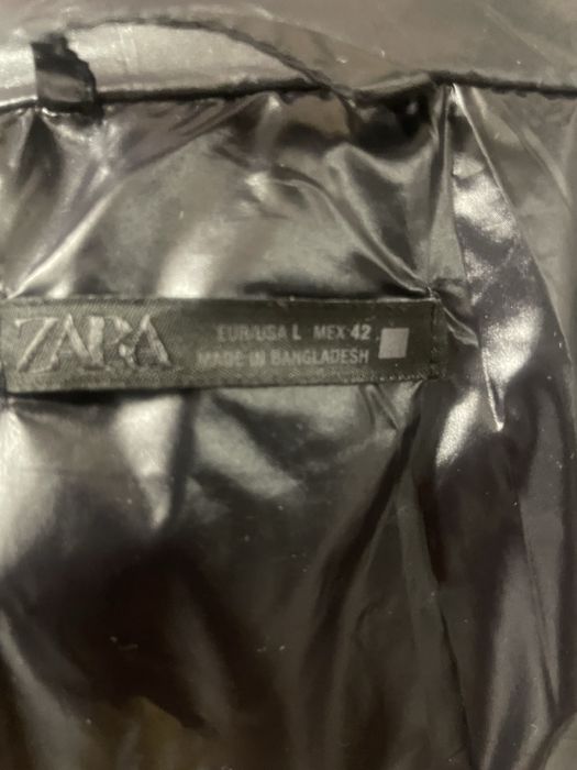 пуховик зара новий