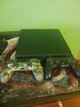 Playstation 4 slim/1TB/kamerka playstation v2/5 gier/dwa pady