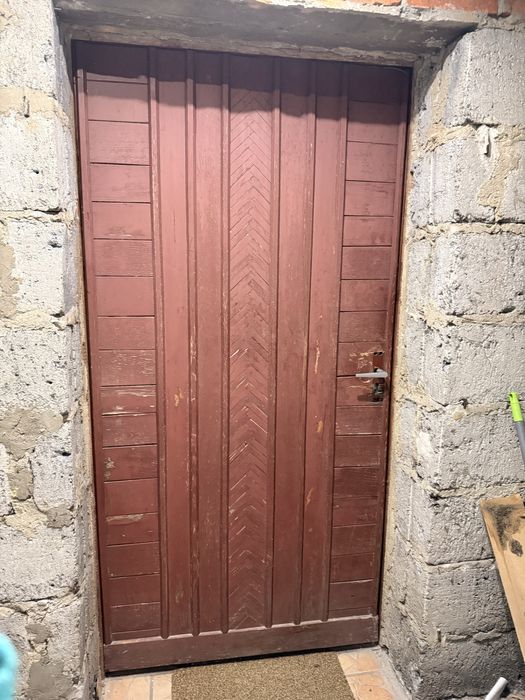 Drewniane drzwi zew szer 100