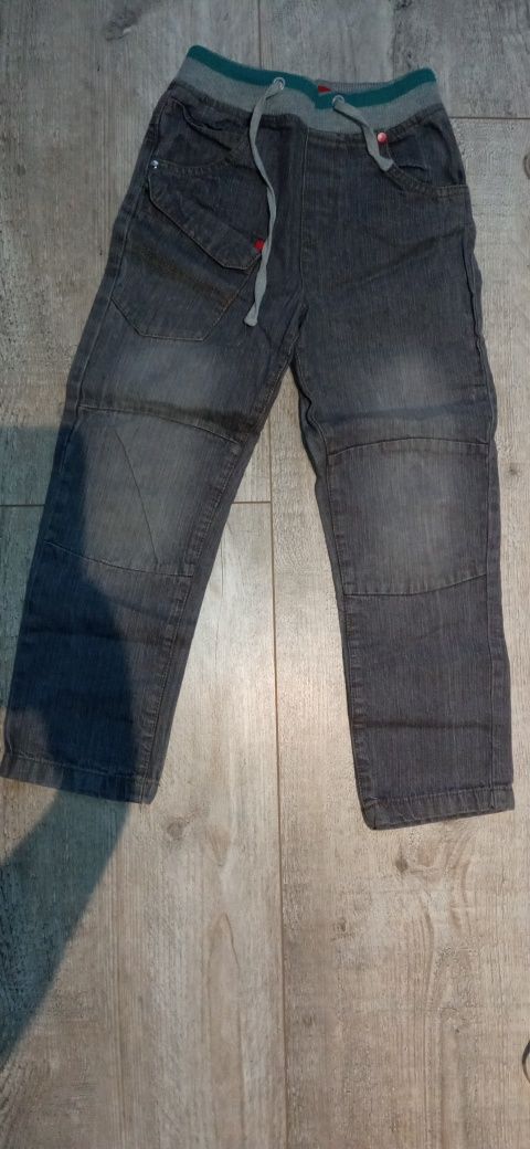 Szare spodnie jeansowe wciągane, w pasie wiązane r. 122-128