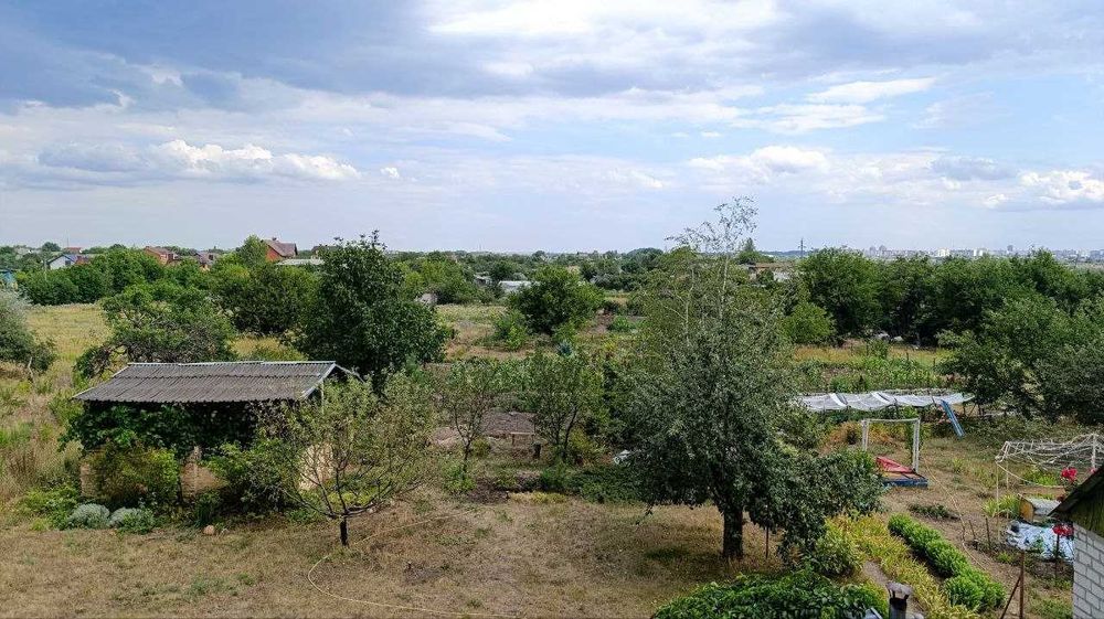 Продам дом в Подгородном с отличным участком