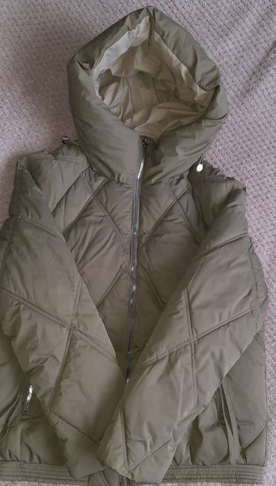 Жіноча зимова куртка 46