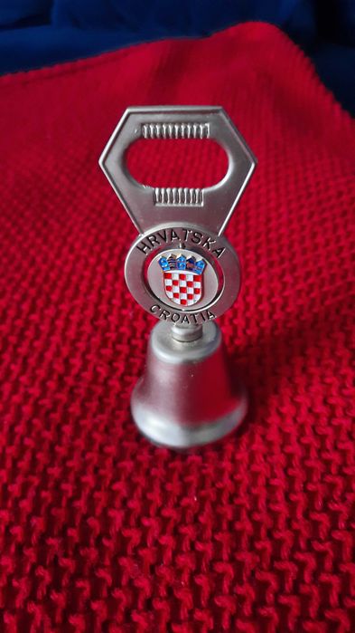 Suwenir - otwieracz z dzwonkiem