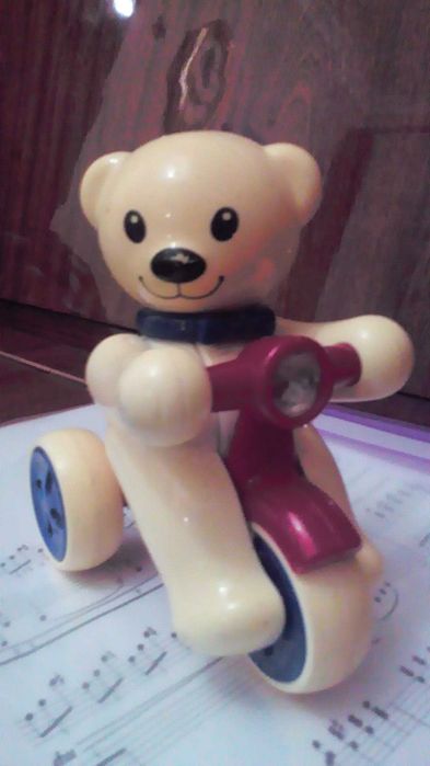 Игрушка Мишка на велосипеде