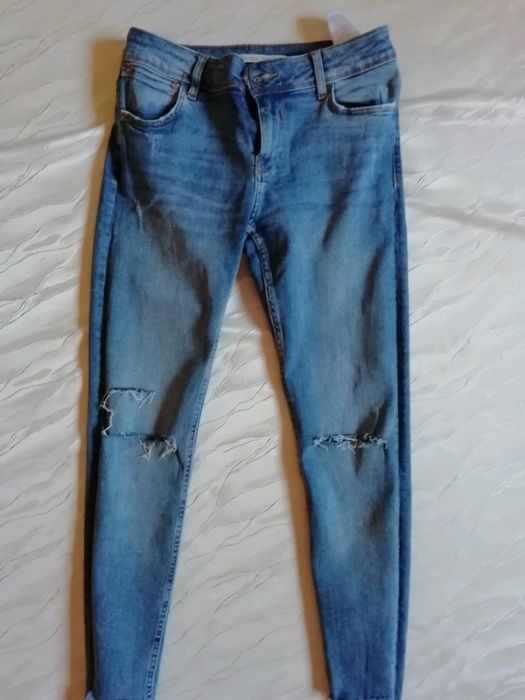 Spodnie jeansy damskie 38 z dziurami