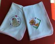 Fraldas de pano bordadas