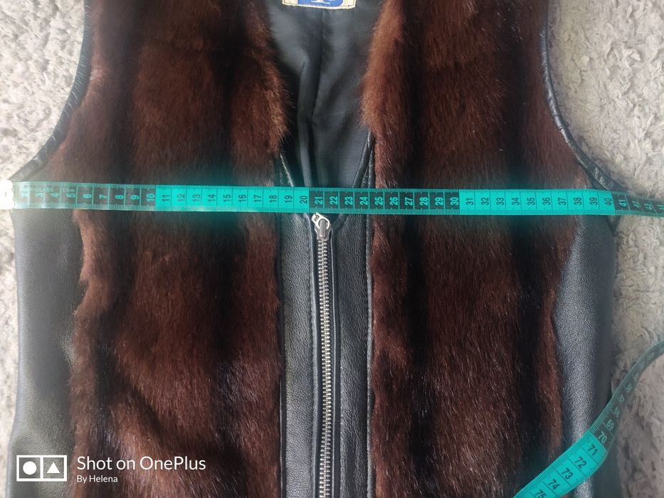 Шкіряна жилетка з хутром