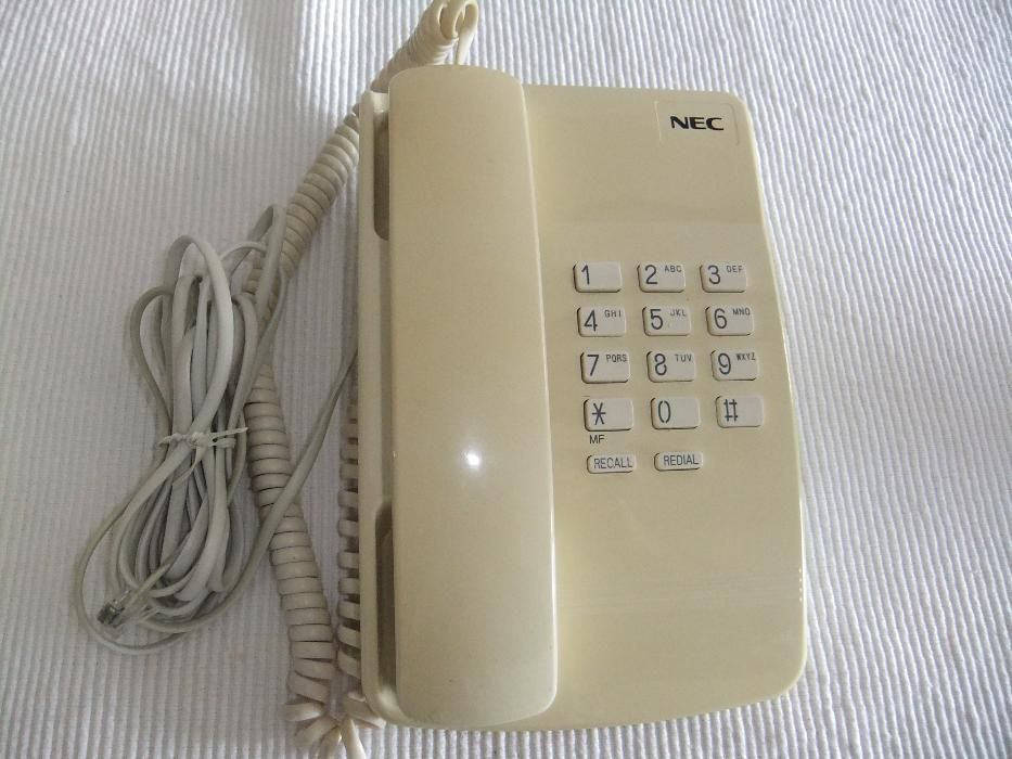 Telefone NEC em bom estado de conservação e funcionamento.