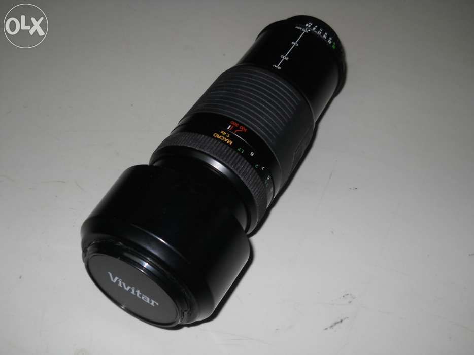 Vendo ou Troco Nikon F50+2 Objectivas+Flash+Mala