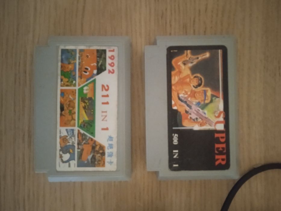 2 jogos Nintendo antigos e comando