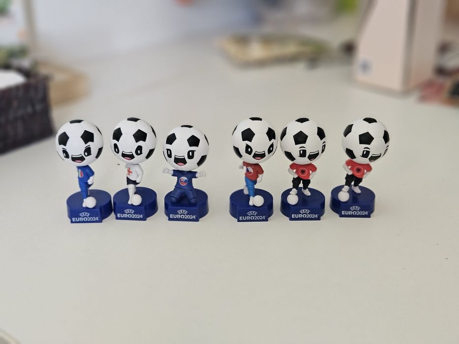 Jogadores com cabeça de bola europeu