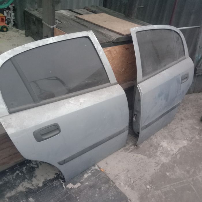 Продам двери Опель астра Джи