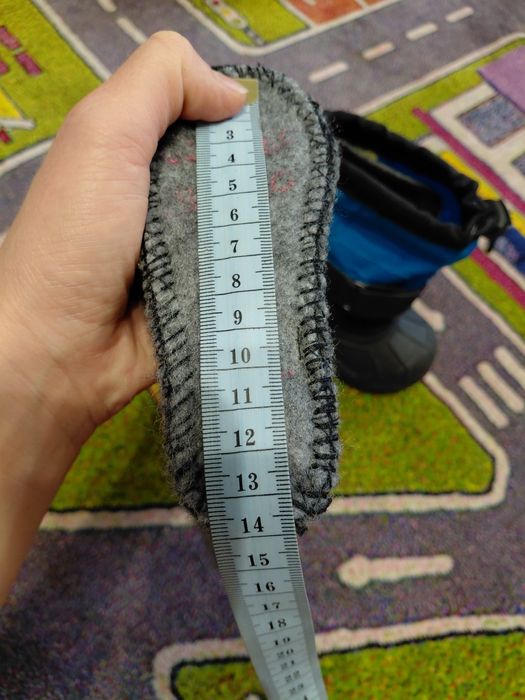 Пуховий комбінезон та чоботи Columbia