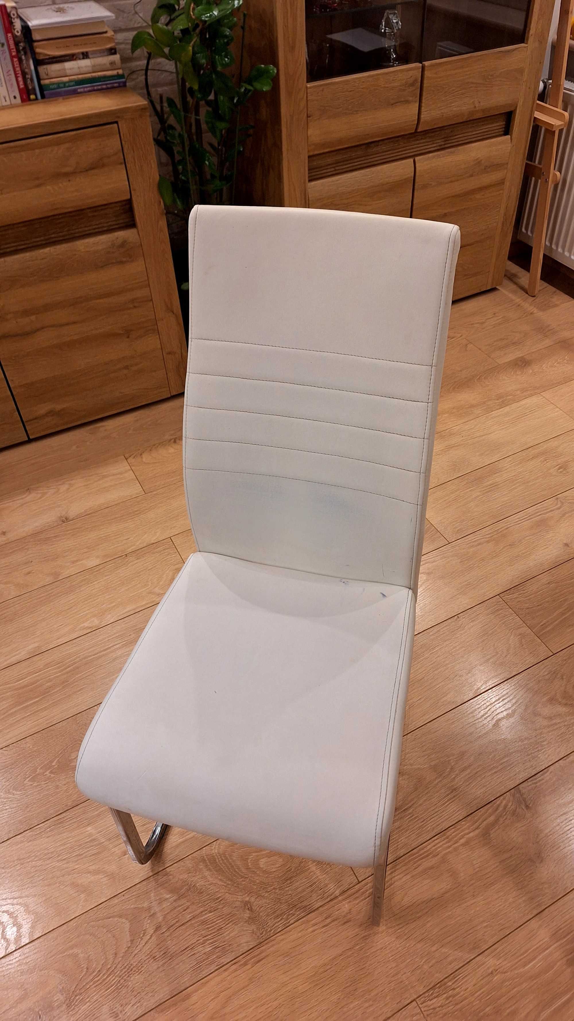 Sprzedam 2 białe krzesła metalowe modern
