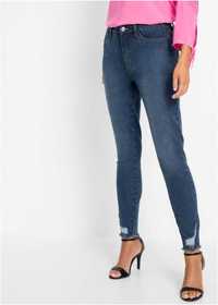 B.P.C spodnie jeansowe damskie wystrzępione 40.