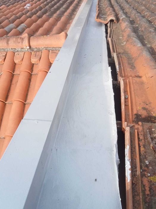Telhados e remodelação de moradia