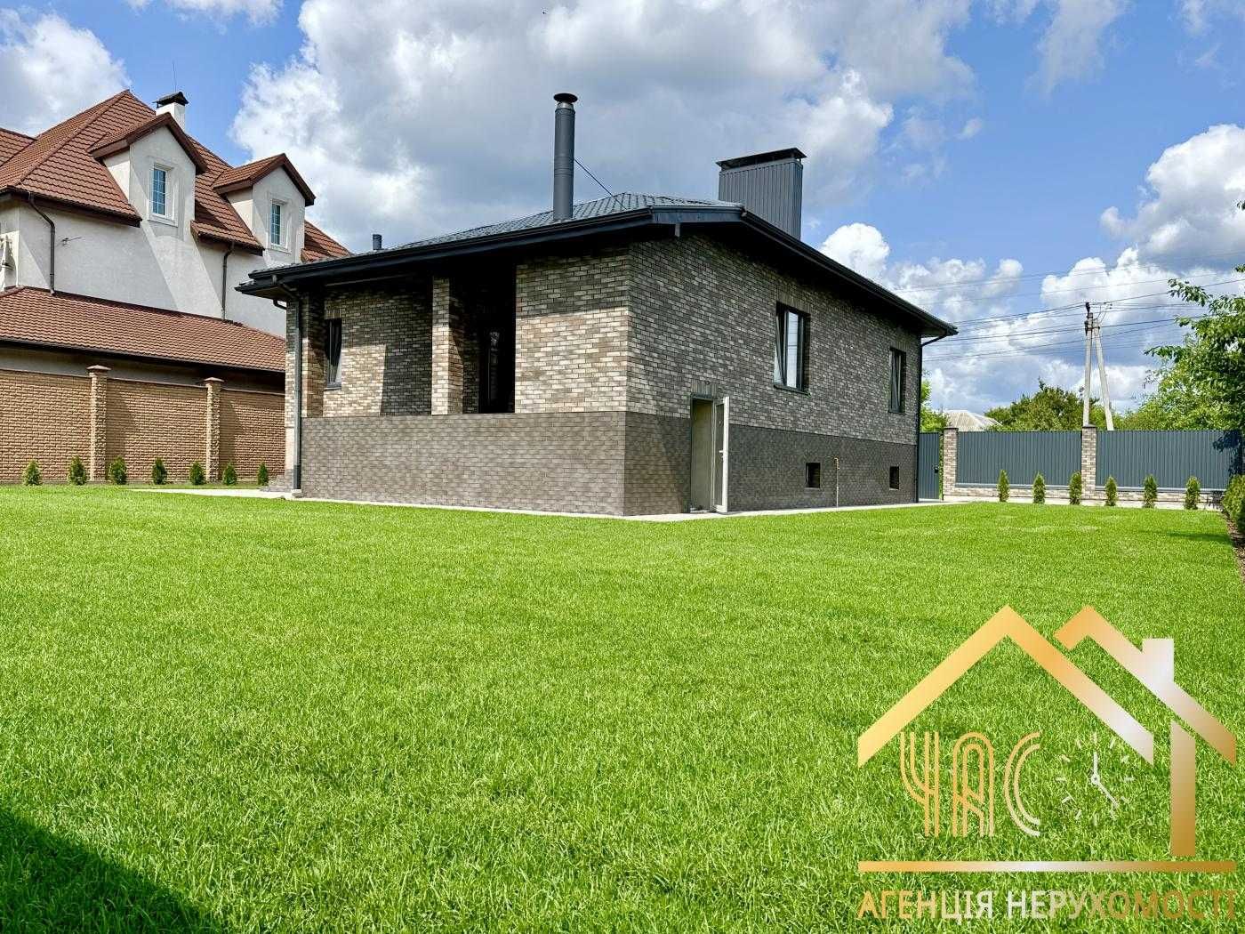 Продаж будинку 228м² з цокольним поверхом, гаражем, навісом та терасою