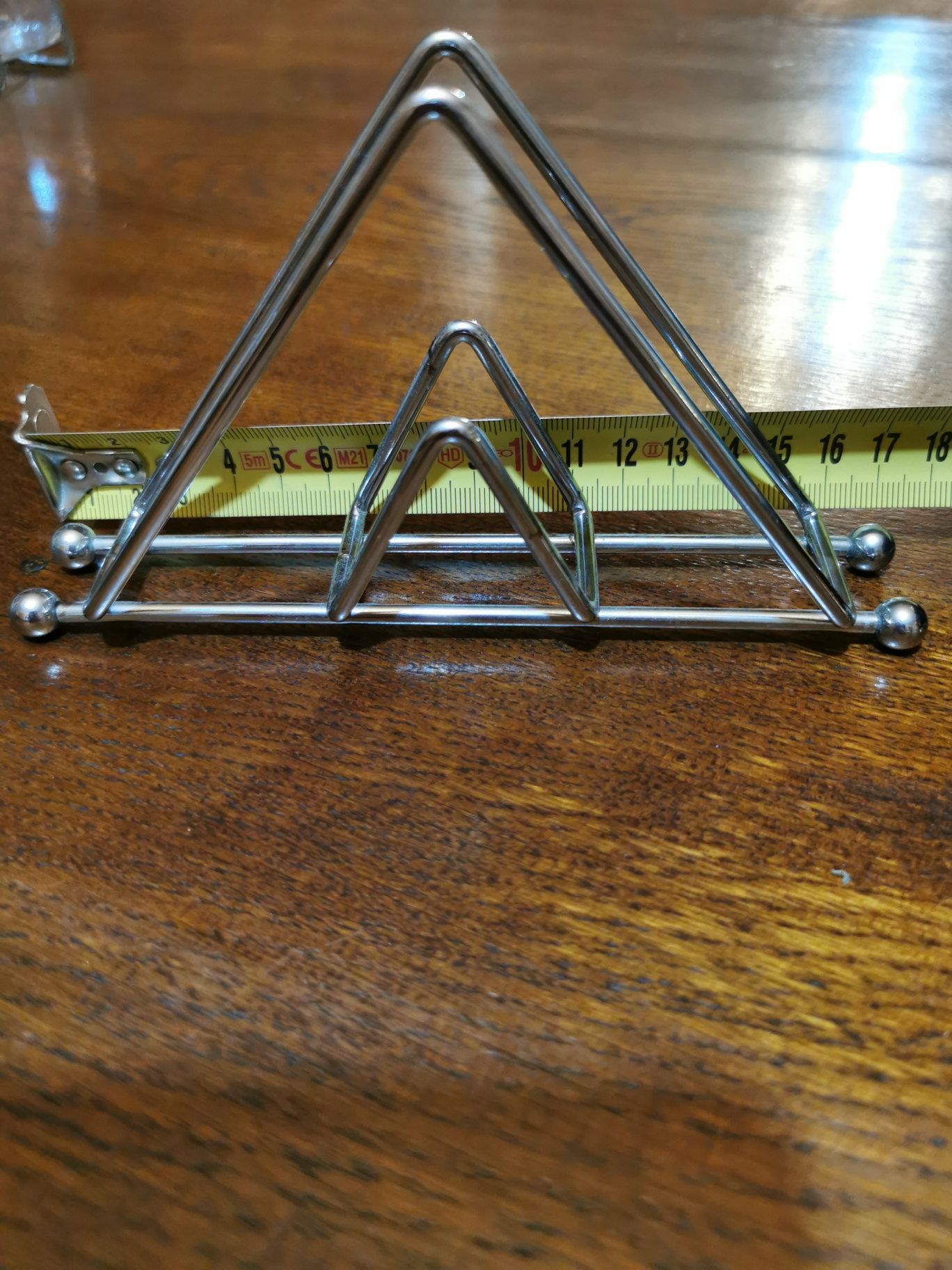 Serwetnik metalowy chromowany trójkątny