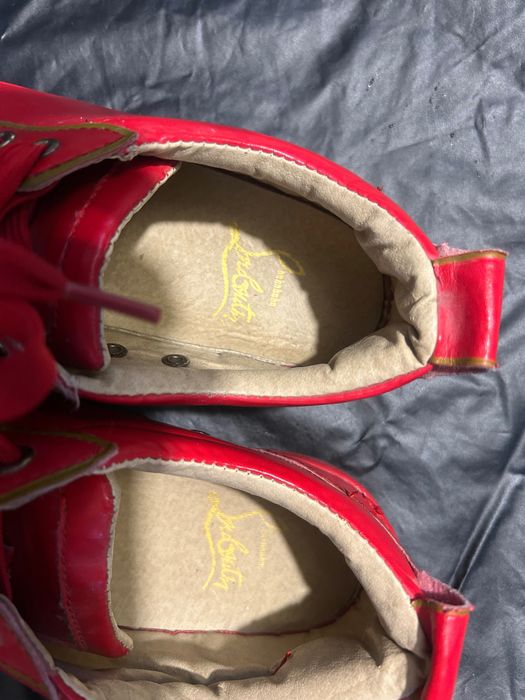 Ténis Louboutin vermelhos