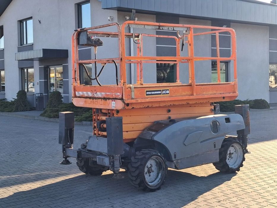 Haulotte Compact 12 DX  zwyżka nożycówka podnośnik koszowy