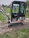 Minikoparka Bobcat X320