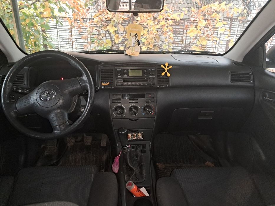 Тойота корола е120