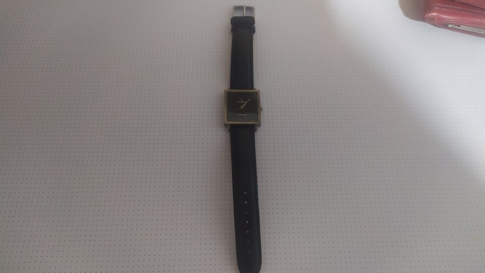 Часы ROMANSON titanium.