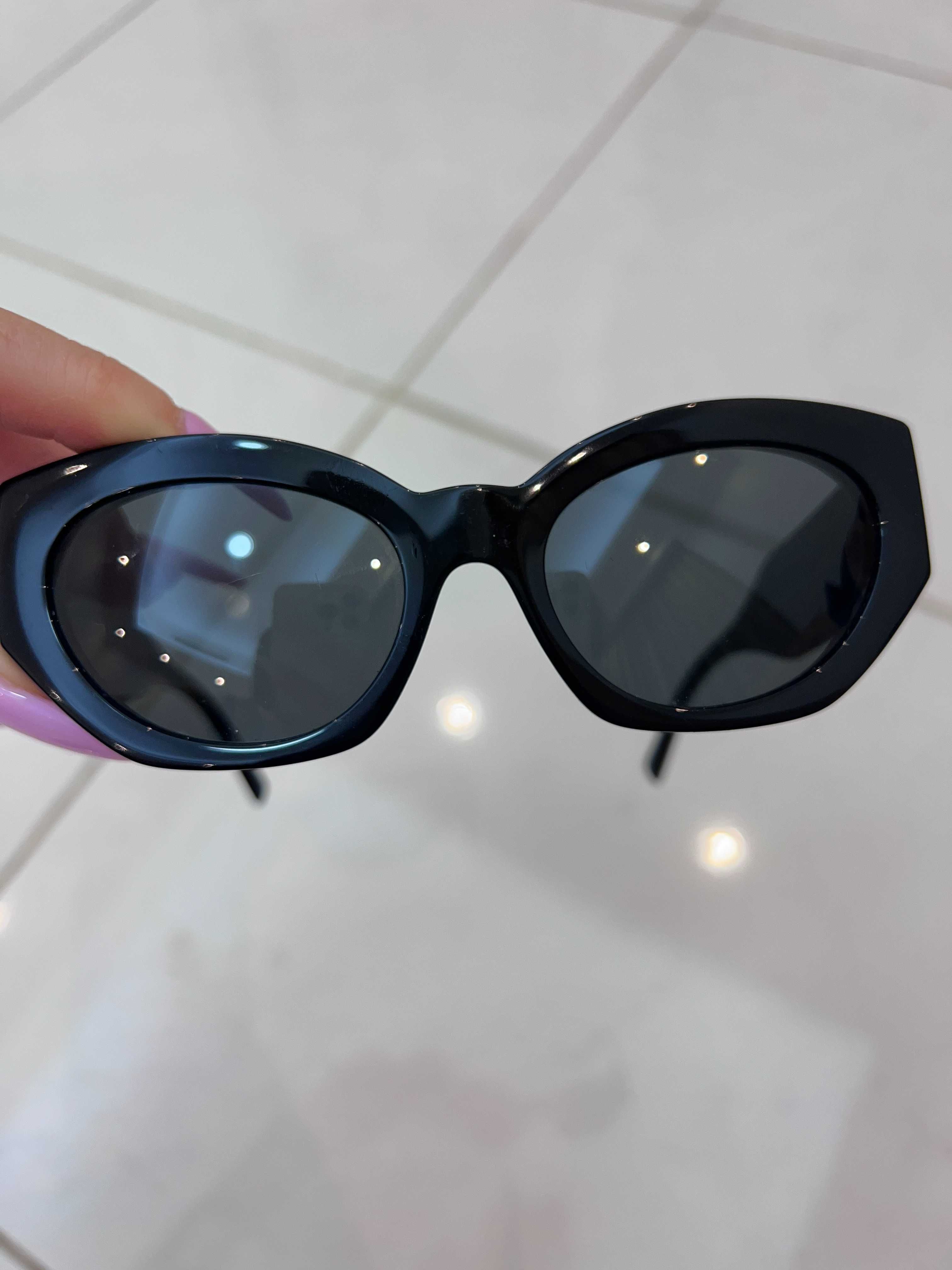 czarne okulary przeciwsłoneczne markowe