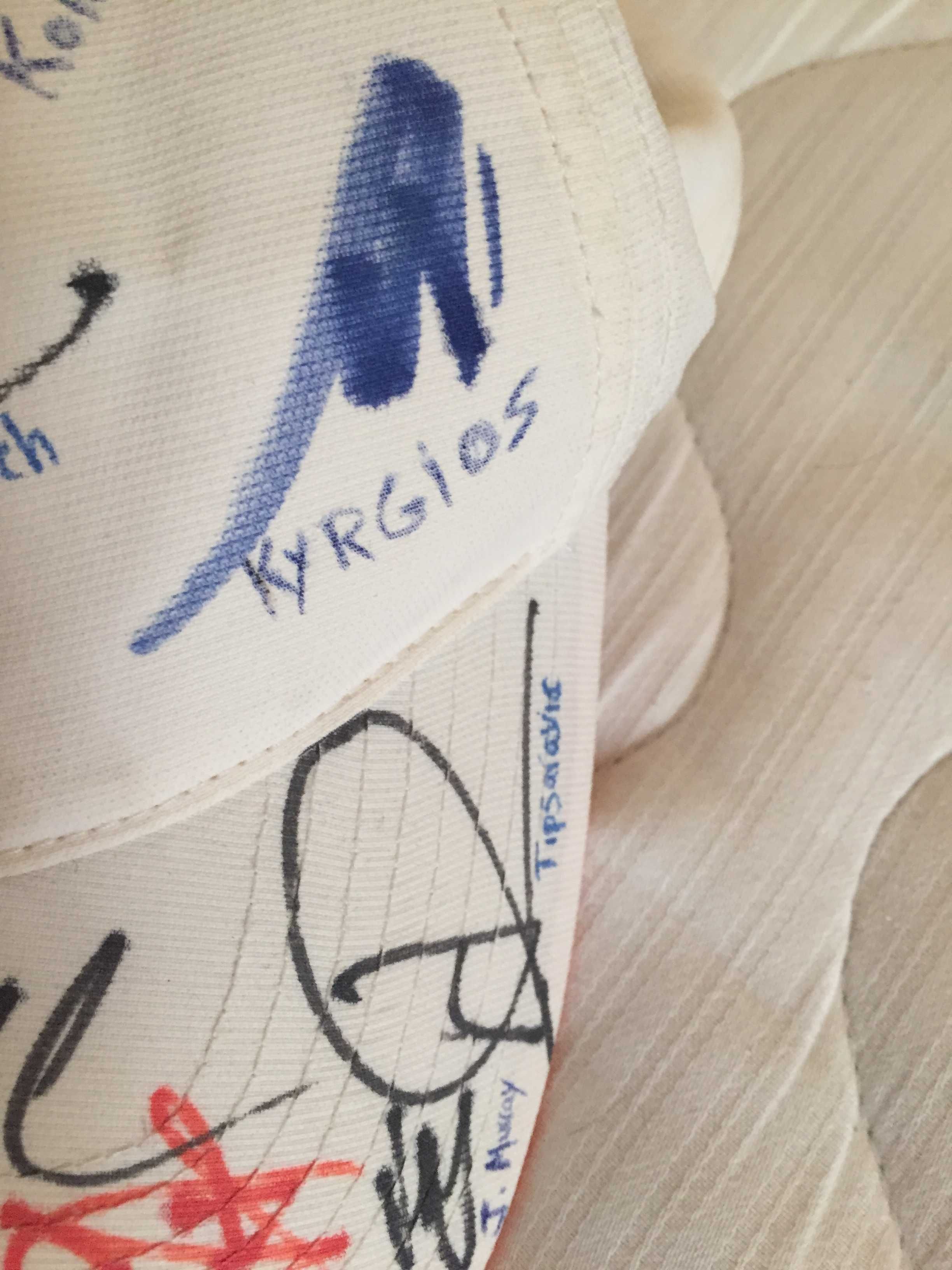 Multi signed Addidas hat by Djokovic, Del Potro and other ATP players