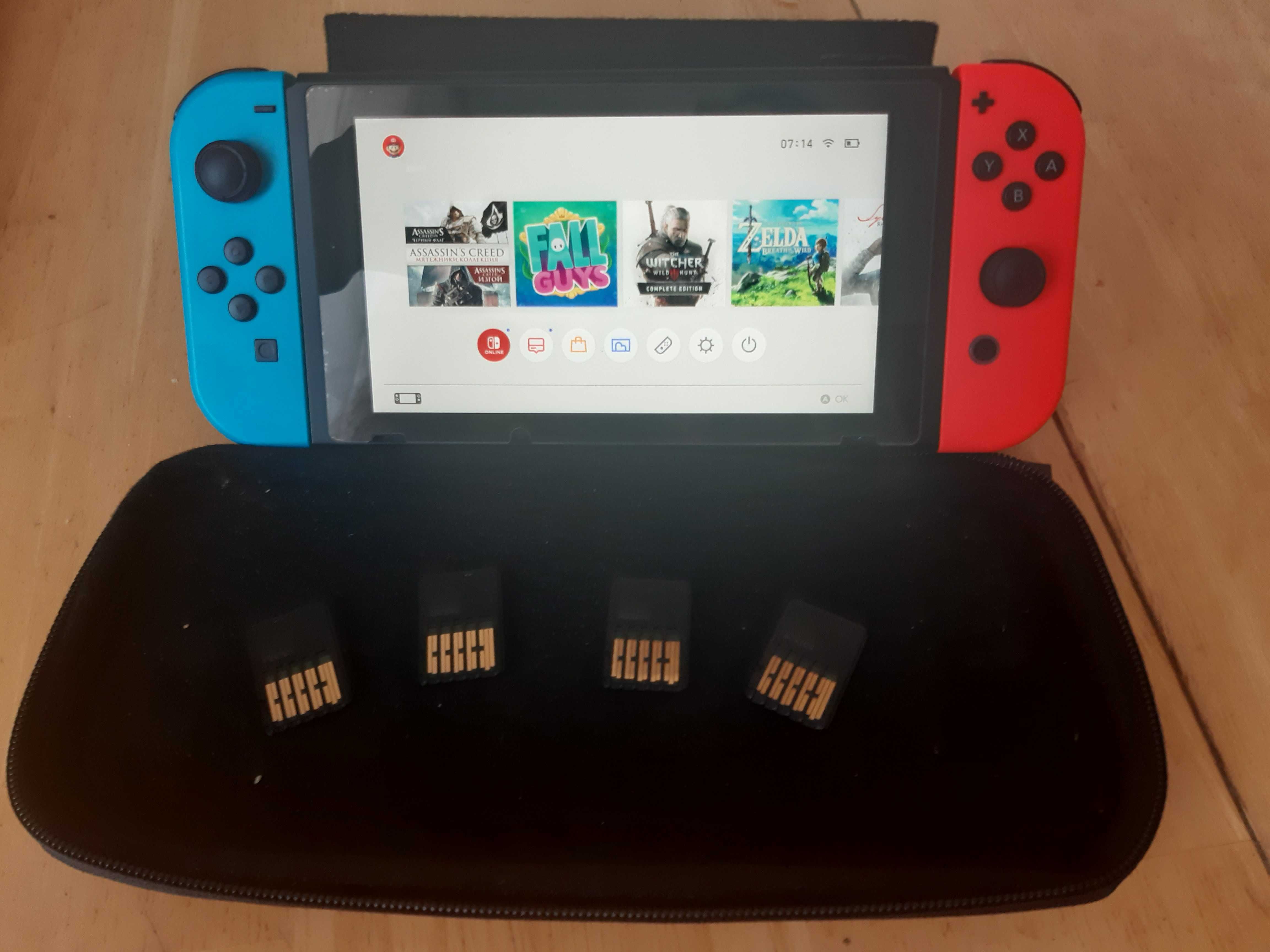 Nintendo Switch в ідеальному стані + 4 гри