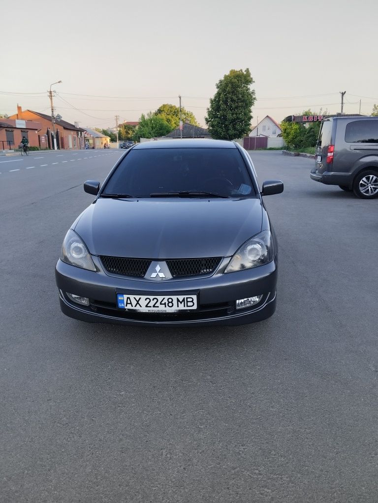 Митсубиси Лансер 9 2л .