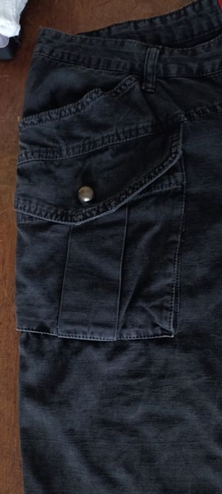 Calças pretas tipo pirata