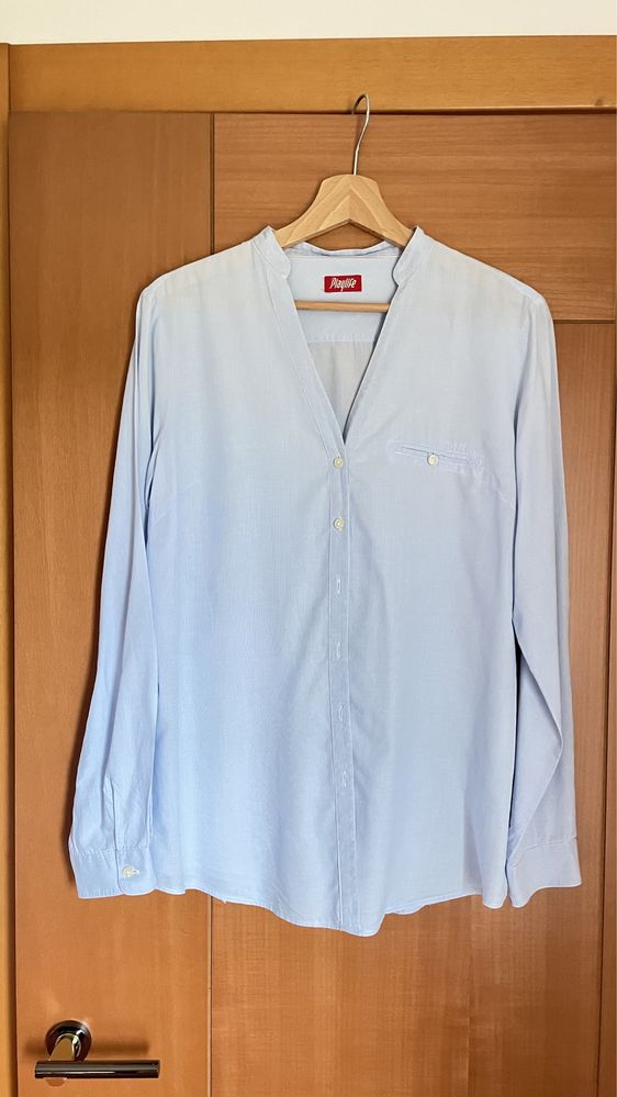Camisa usada azul clara Sra.