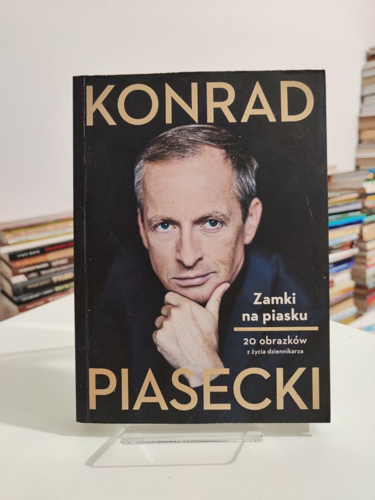Zamki na piasku - Konrad Piasecki .