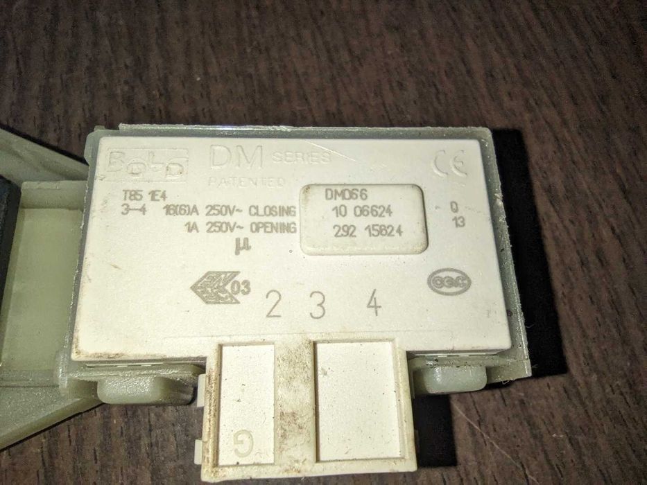 Замок люка стиральнрй машинки Model DM066