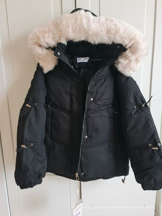 Продам новую куртку- пуховик  зима