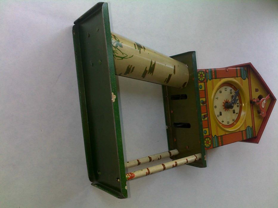 Детская жестяная заводная игрушка с ключиком ссср часы часики птичка