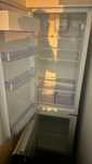 Frigorífico usado + máquina de lavar de embutir com tambor avariado