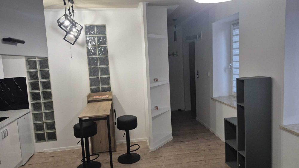 Nowa, nowoczesna kawalerka z oddzielną sypialnią na Śródmieściu