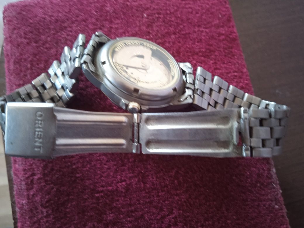 Ручные мужские часы Orient titan automatic.В рабочем состоянии.
