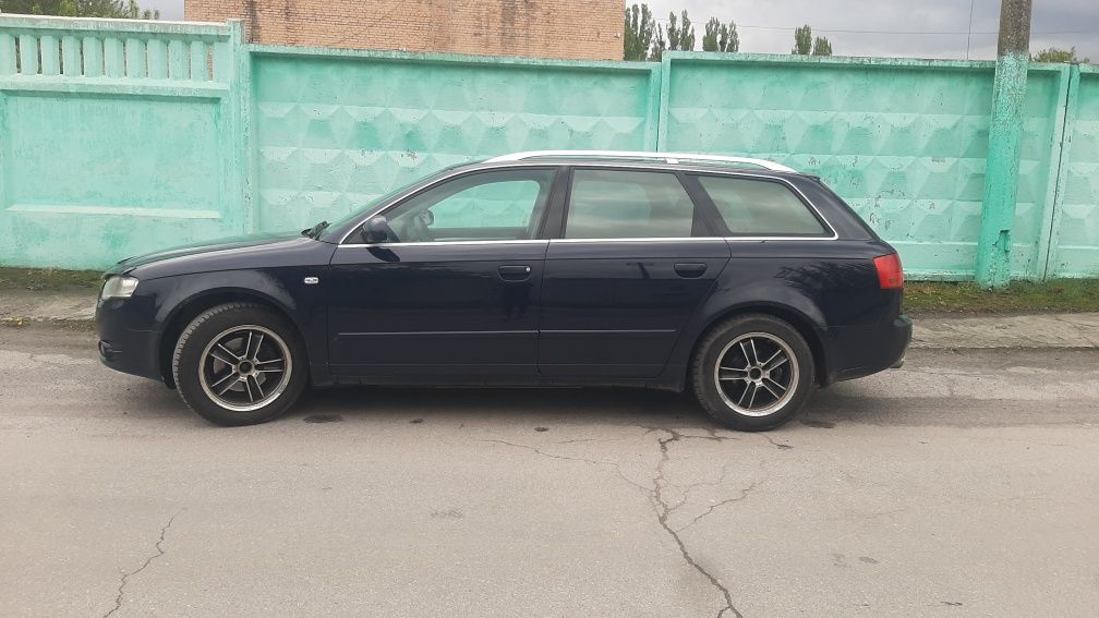 Audi a4b7 газ/бенз автомат