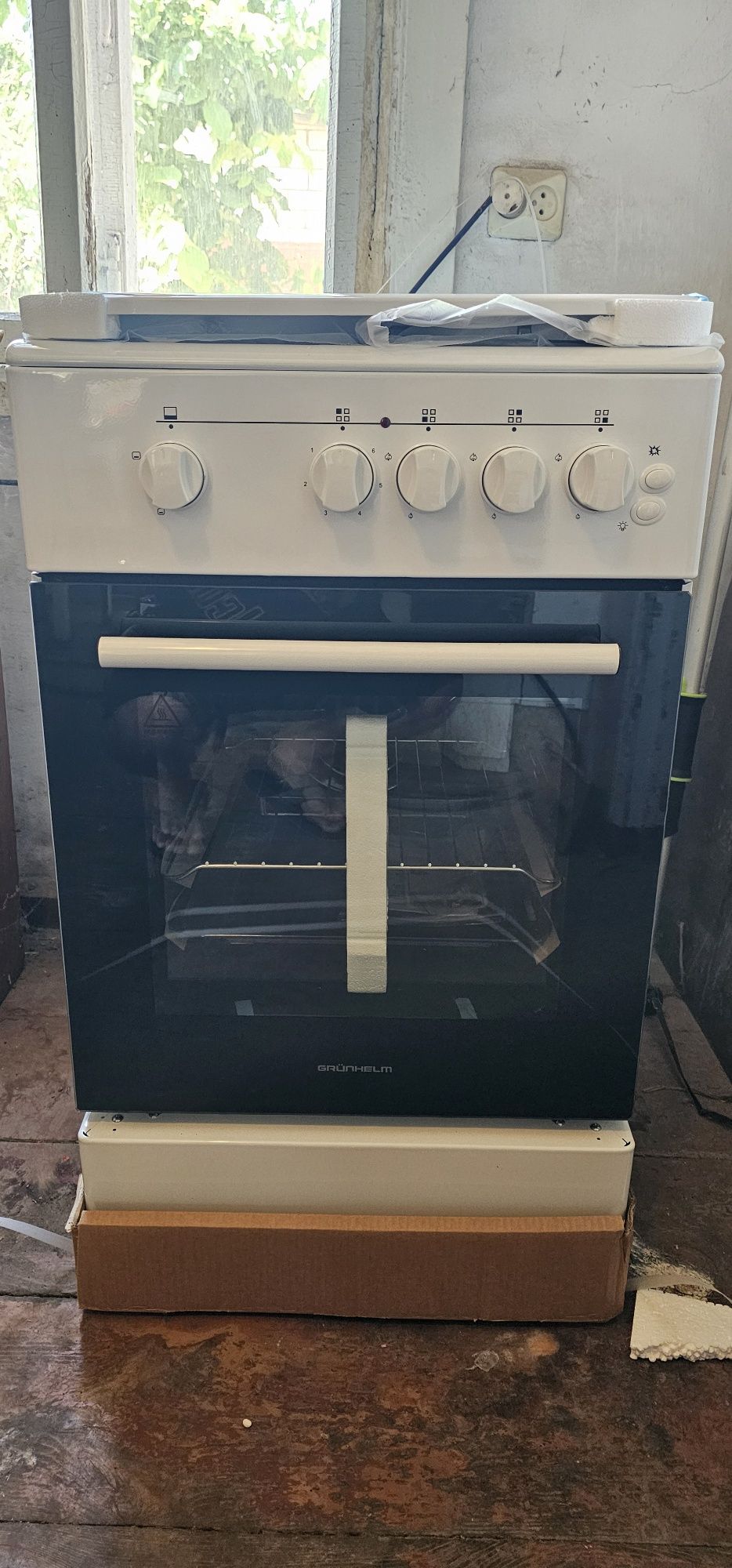 Плита газоэлектрическая GFM5611W Grunhelm