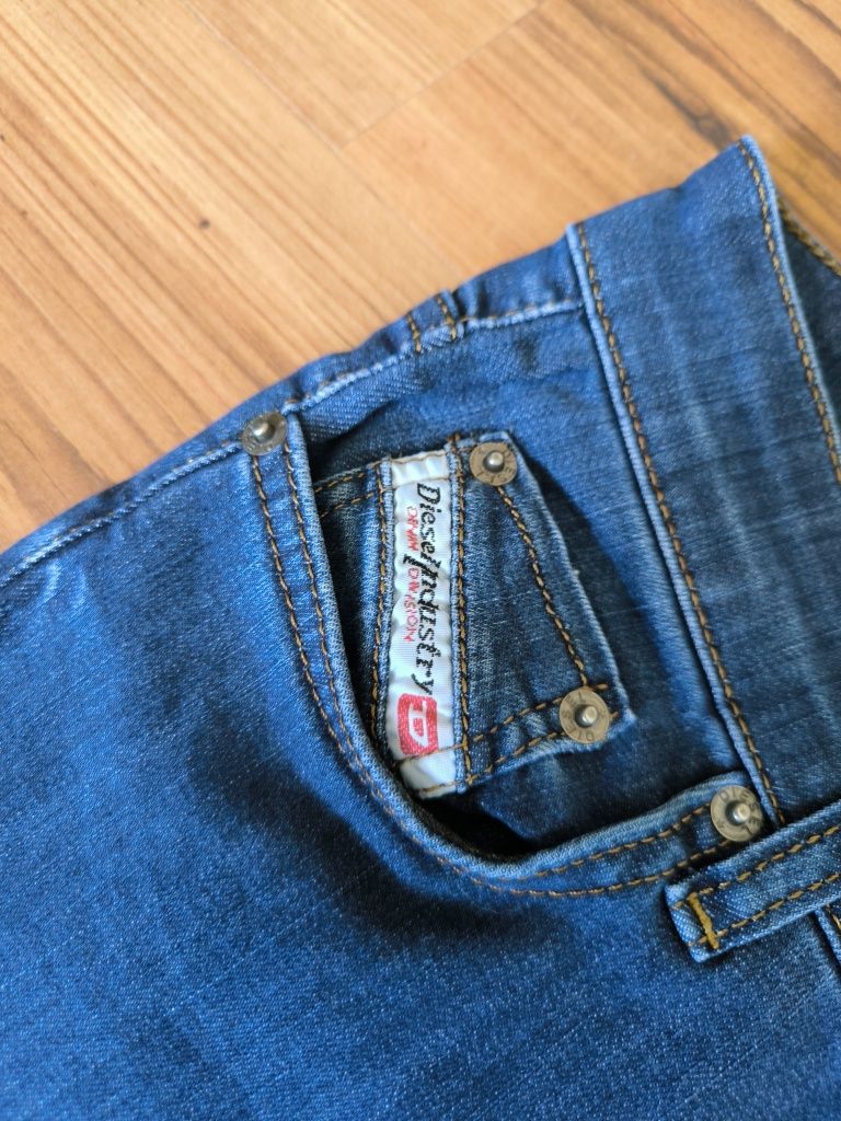 Diesel spodnie damskie niebieskie przecierane 30x34 elastyczne slim